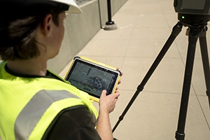 Trimble T110 tablet in surveyors hand