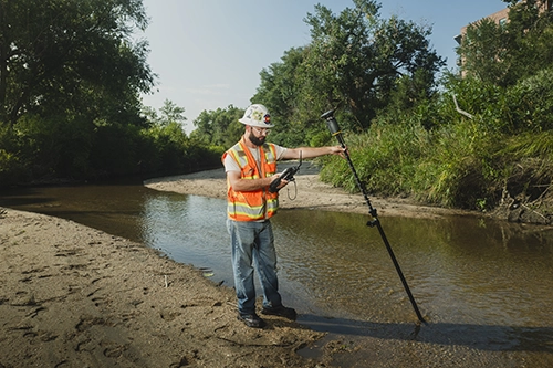 Trimble ST30 in river with man with controller